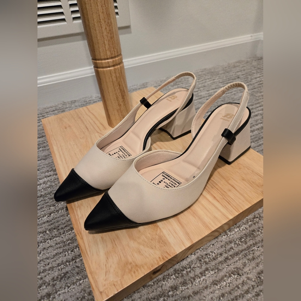 Beautiful slingback two tone leather heels. Chunky medium heel.
